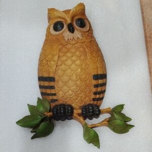 Wooden Owl Figurine with Green Leaves